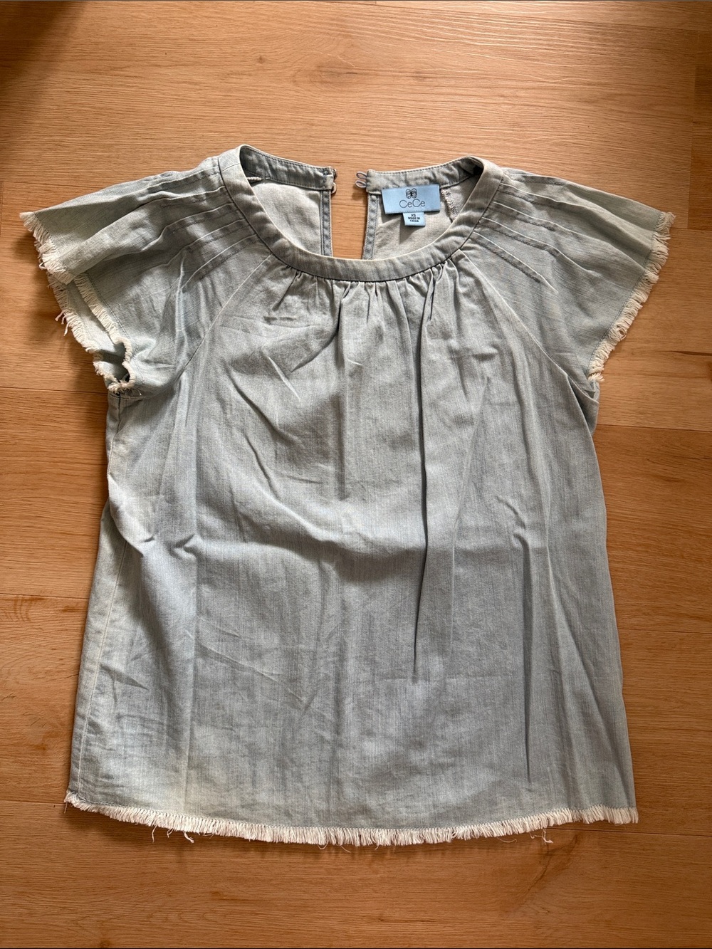 CeCe Light Blue Fringe Sleeve Chambray Top
